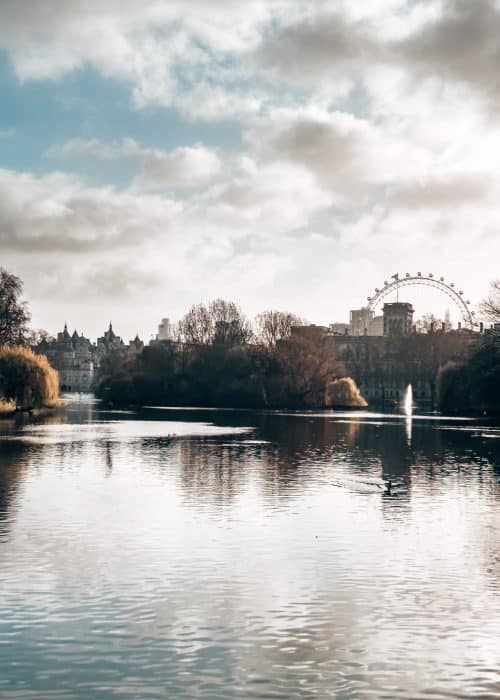 A pond with the London Eye in the background, St James's Park, The Blue Bridge, London Itinerary