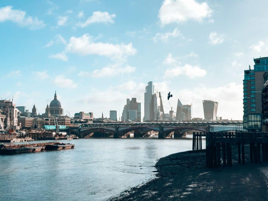 View across the Thames from South Bank to Millennium Bridge, St Pauls and the City of London