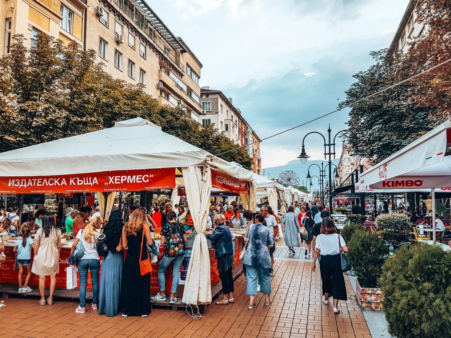 Market stalls on Vitosha Boulevard with Vitosha Mountain looming in the background, Sofia, Bulgaria