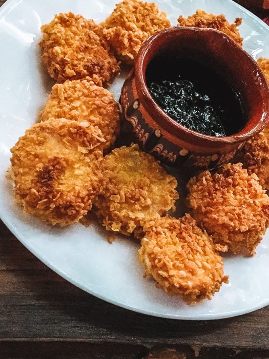 A plate of melted cheese and cornflakes with jam, Bulgarian Cuisine