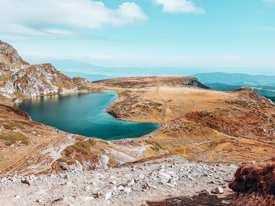 Kidney Lake shimmering under the sun surrounded by mountains, Seven Rila Lakes, things to do in Bulgaria