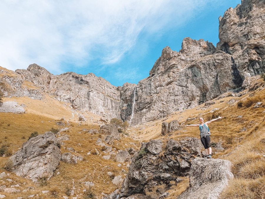 Helen stood in front of Raysko Praskalo, Botev Peak, things to do in Bulgaria