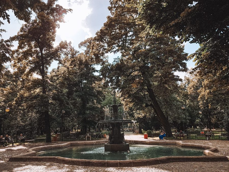 A fountain in Tsar Simeon Central Garden surrounded by trees, Plovdiv, Bulgaria