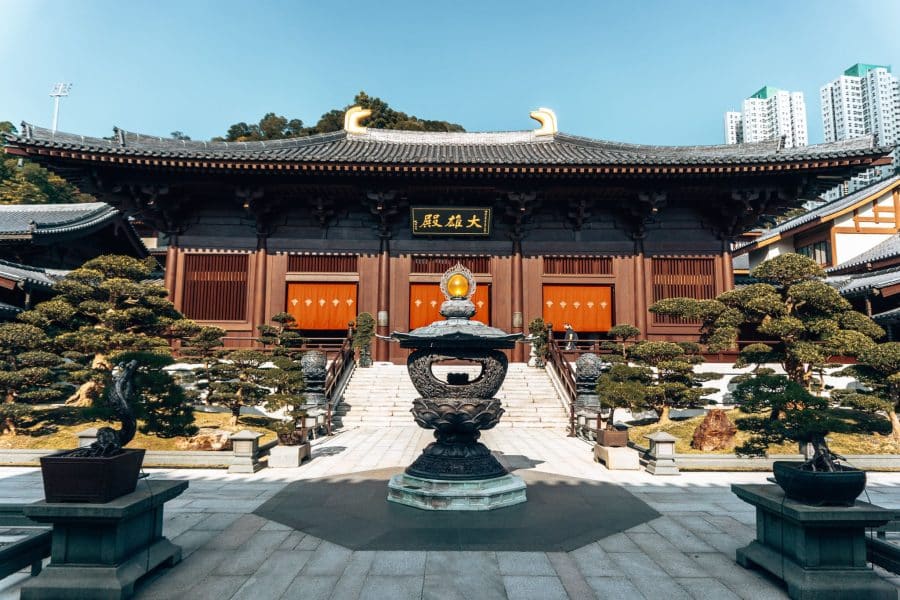 A smaller courtyard with bonsai trees and a large gold incense burner in the middle, Chi Lin Nunnery, Hong Kong