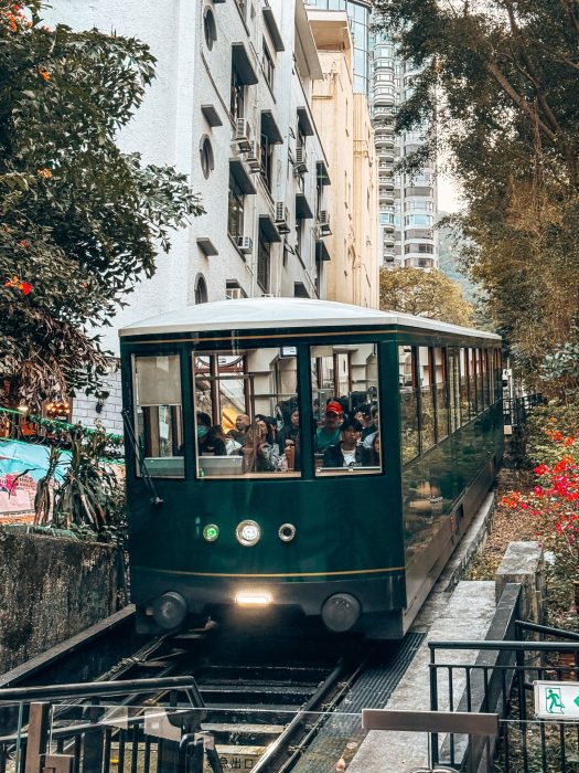 The Peak Tram in between tall buildings, Hong Kong