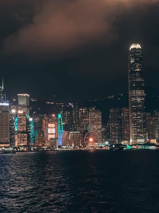 Hong Kong skyscrapers lit up at night in neon lights