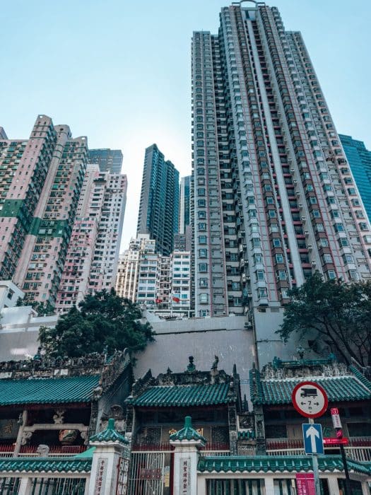 Man Mo Temple with huge skyscrapers towering over it, Things to do in Hong Kong