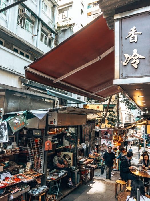 Vintage market stalls on a narrow pedestrianised street, Upper Lascar Row, Hong Kong Itinerary