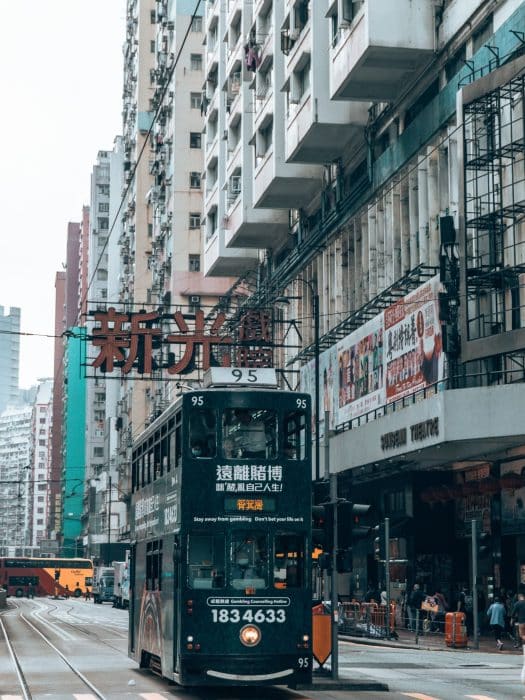 A tram riding the streets of Hong Kong Island