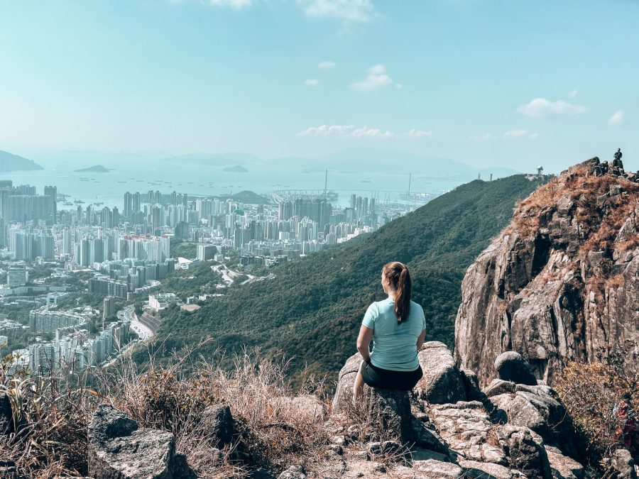 Helen at the summit of Lion Rock looking over Hong Kong and out to the ocean