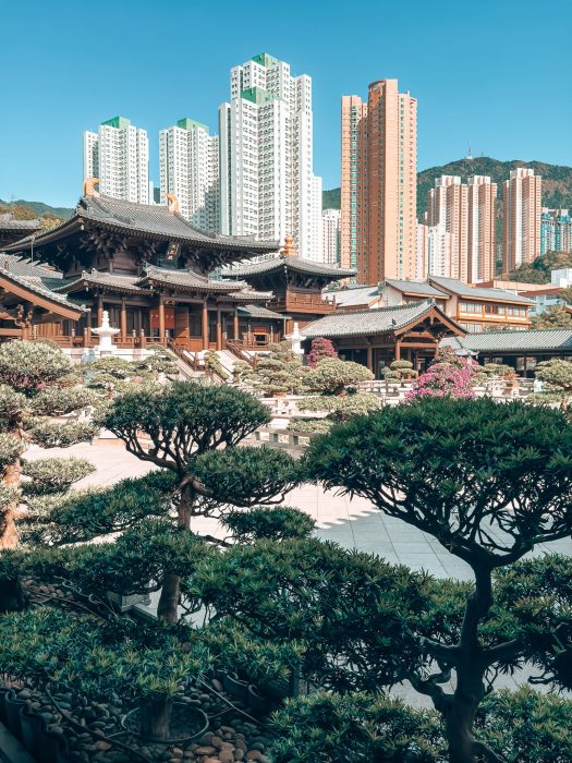 The Chi Lin Nunnery temple complex with huge skyscrapers behind it, Hong Kong