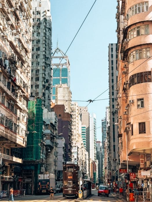 Ding Dings riding through the streets of Hong Kong Island