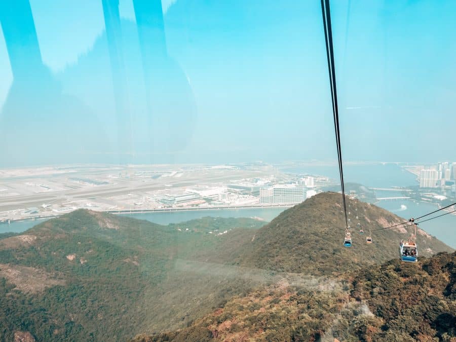 Getting higher on the cable car with views over Hong Kong International Airport and North Lantau Country Park