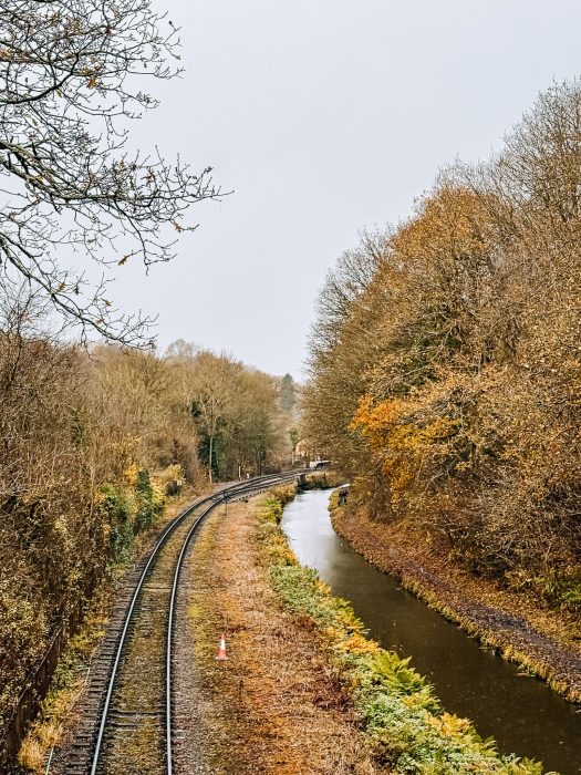 A small railway line running alongside Churnet River, Churnet Valley Railway, Consall Nature Park, The Tawny Hotel, Staffordshire
