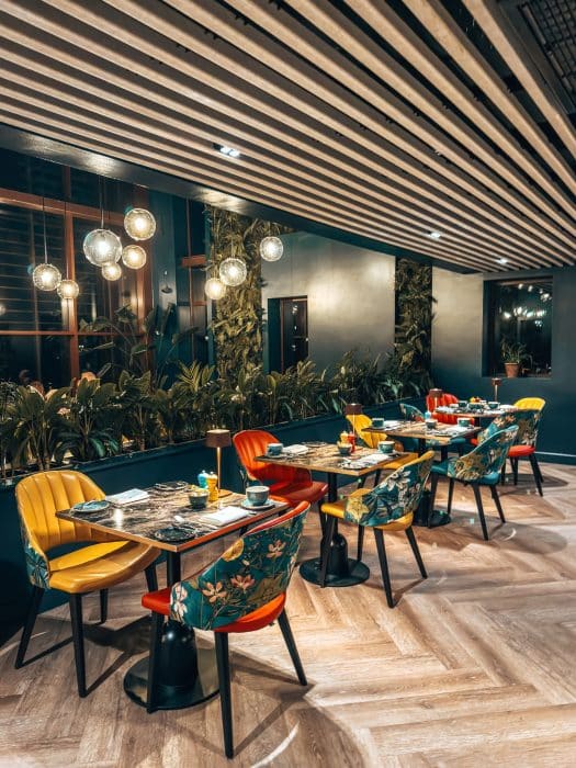The colourful interior of the restaurant in the Plumicorn at the Tawny Hotel, best hotels in Staffordshire