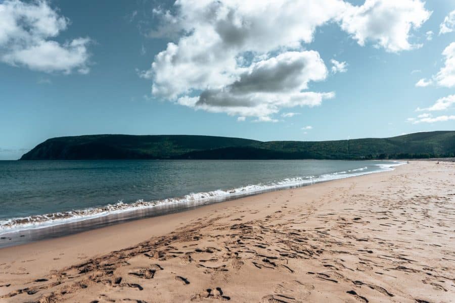 A long stretch of white sand and ocean, Ingonish Beach, Cabot Trail, Things to do in Nova Scotia
