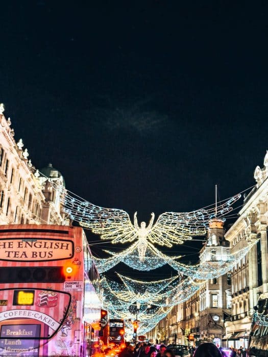 Huge sweeping angels floating above Regent Street, London at Christmas