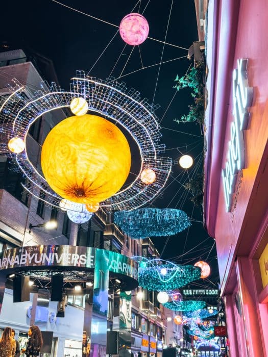 Brightly coloured planets hanging above Carnaby Street, Best Christmas decorations in London