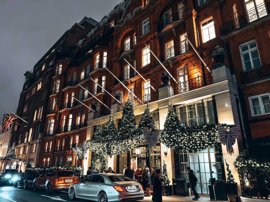 A line of Christmas trees above the entrance of Claridge's Hotel, Best Christmas Decorations in London