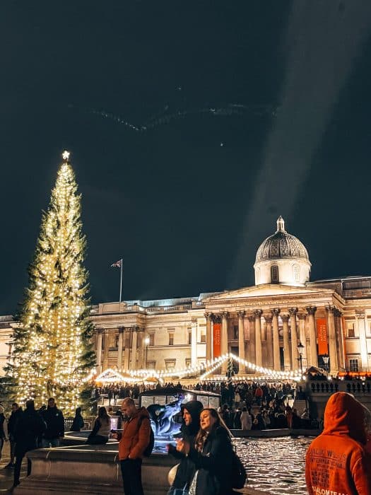A Christmas tree in front of the National Gallery, Trafalgar Square at Christmas, London