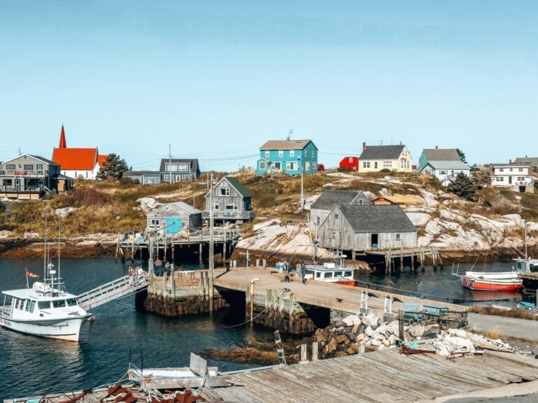 Colourful houses and fishing boats in Peggy's Cove, best places to visit in Nova Scotia, Canada