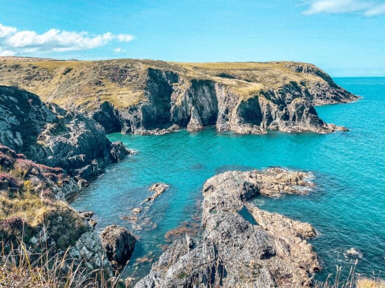 Rugged coastline and turquoise ocean on the Whitesands to Porthgain Walk along the Pembrokeshire Coast Path, Wales